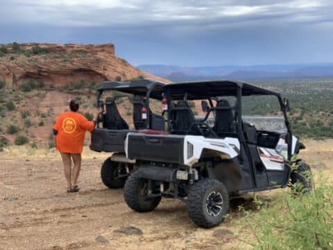 2-seater and 4-seater atv rental customer posing outside ATV in the beautiful Verde Valley